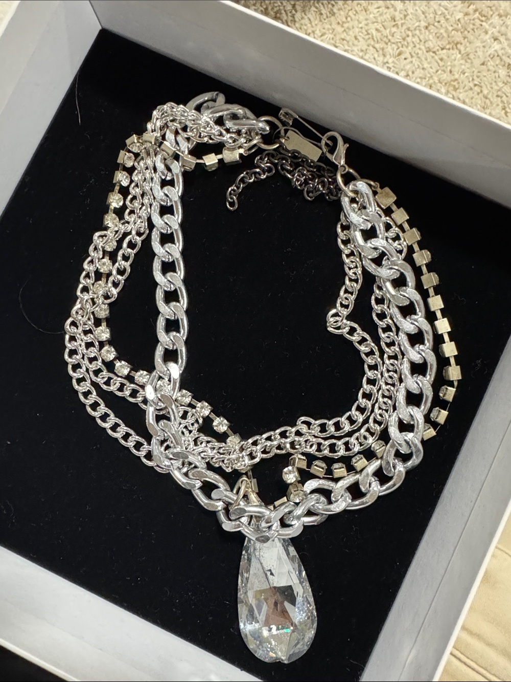 Multi-Chain Silver Necklace with Teardrop Crystal Pendant